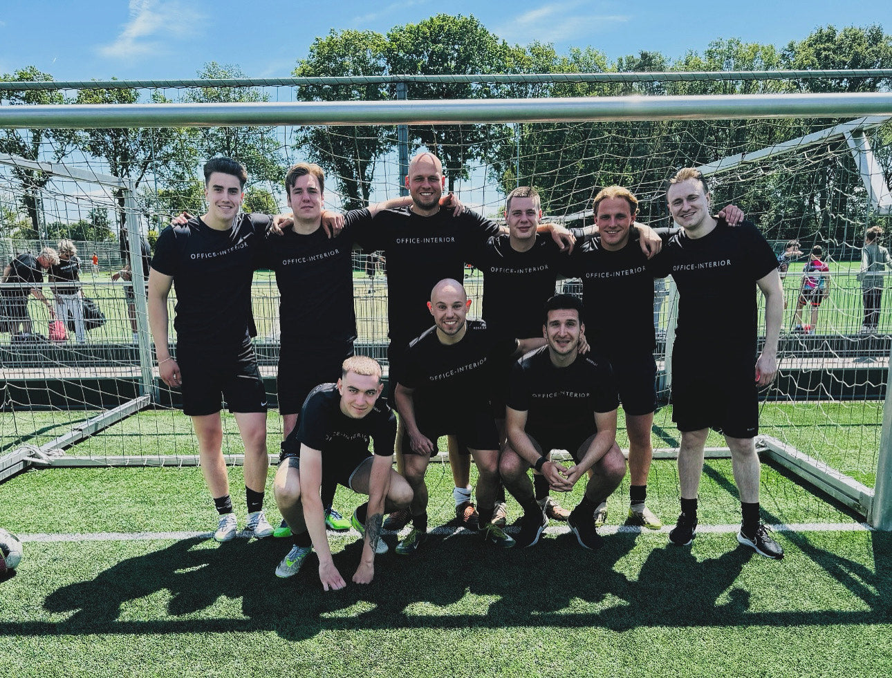 Team OFFICE-INTERIOR on the football pitch